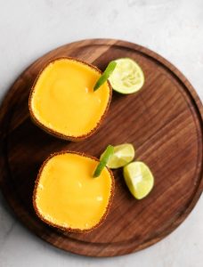 Frozen Mango Margarita with spicy Chile Lime Seasoning
