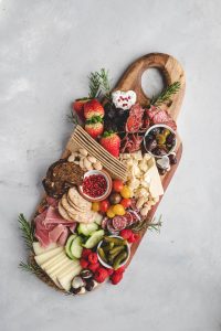 charcuterie board, cheese board, cheese, salami, appetizer, snack