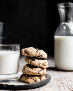 Stack of cookies and milk.