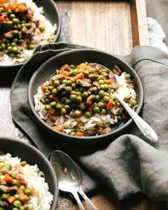 Peas, meat and rice in a bowl