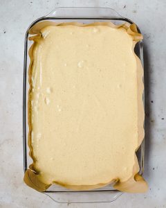 Pumpkin cheesecake filling in baking pan