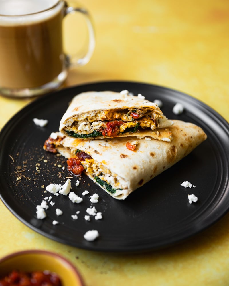 egg taco on plate cut in half